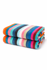 Two folded striped beach towels with colorful stripes on a white background
