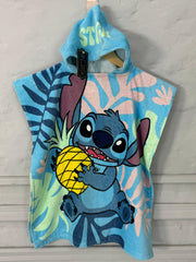 Children's hooded towel with cartoon character holding a pineapple on a light gray background