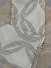 Gray patterned fabric on a stone surface