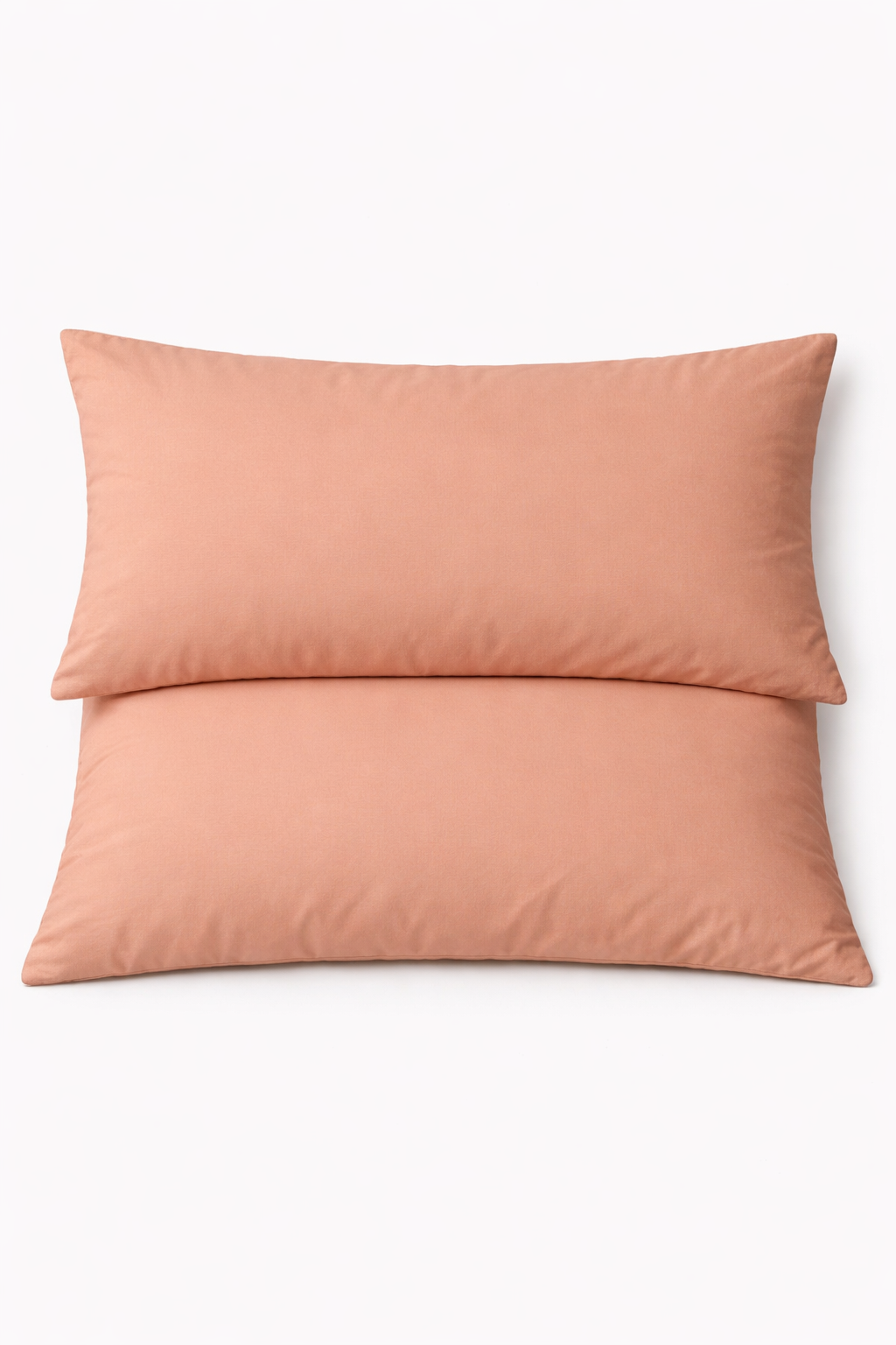 Two pink pillows on a white background