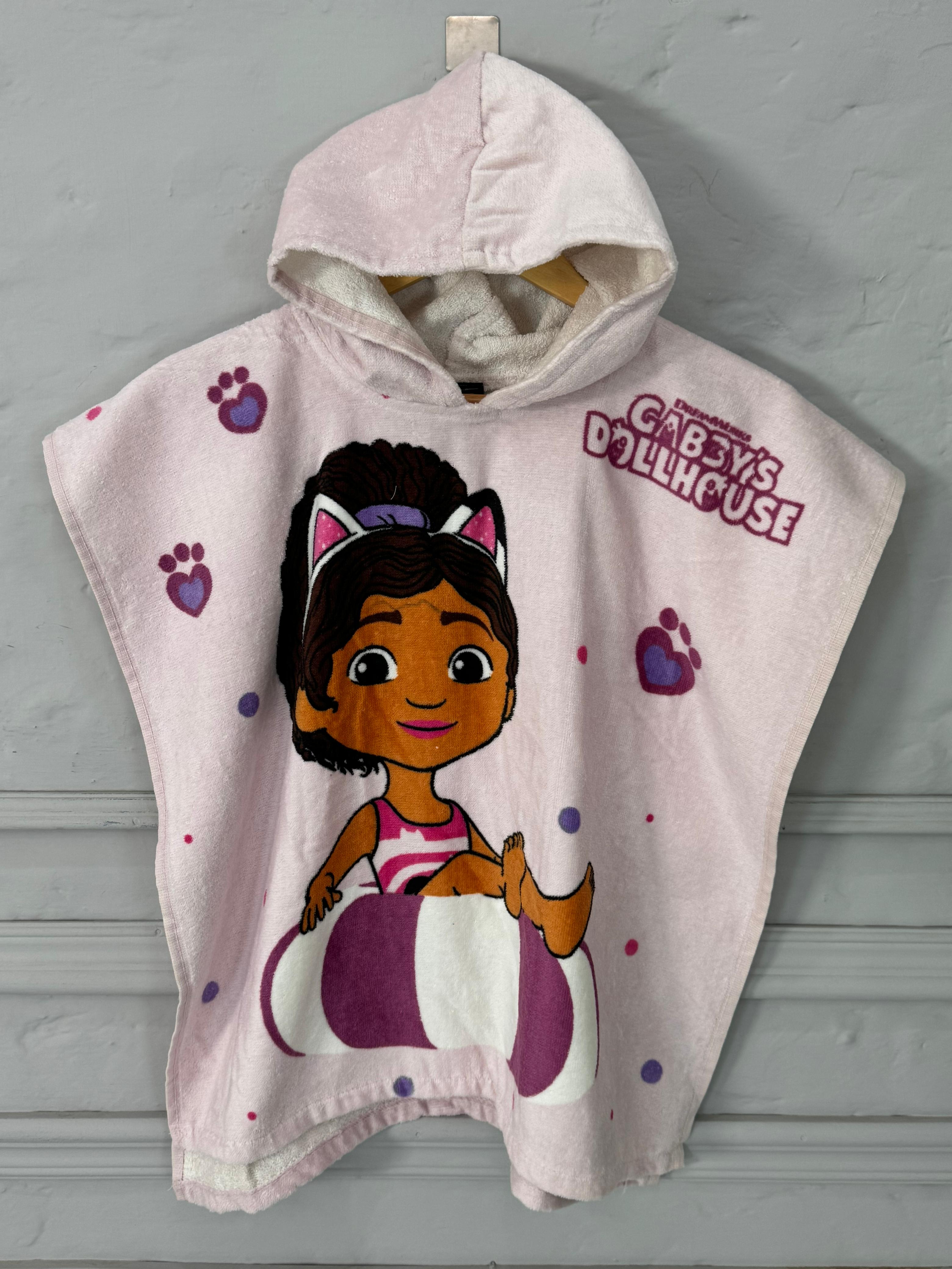 Children's hooded towel with cartoon character and 'Catboy's Dollhouse' text on a gray background