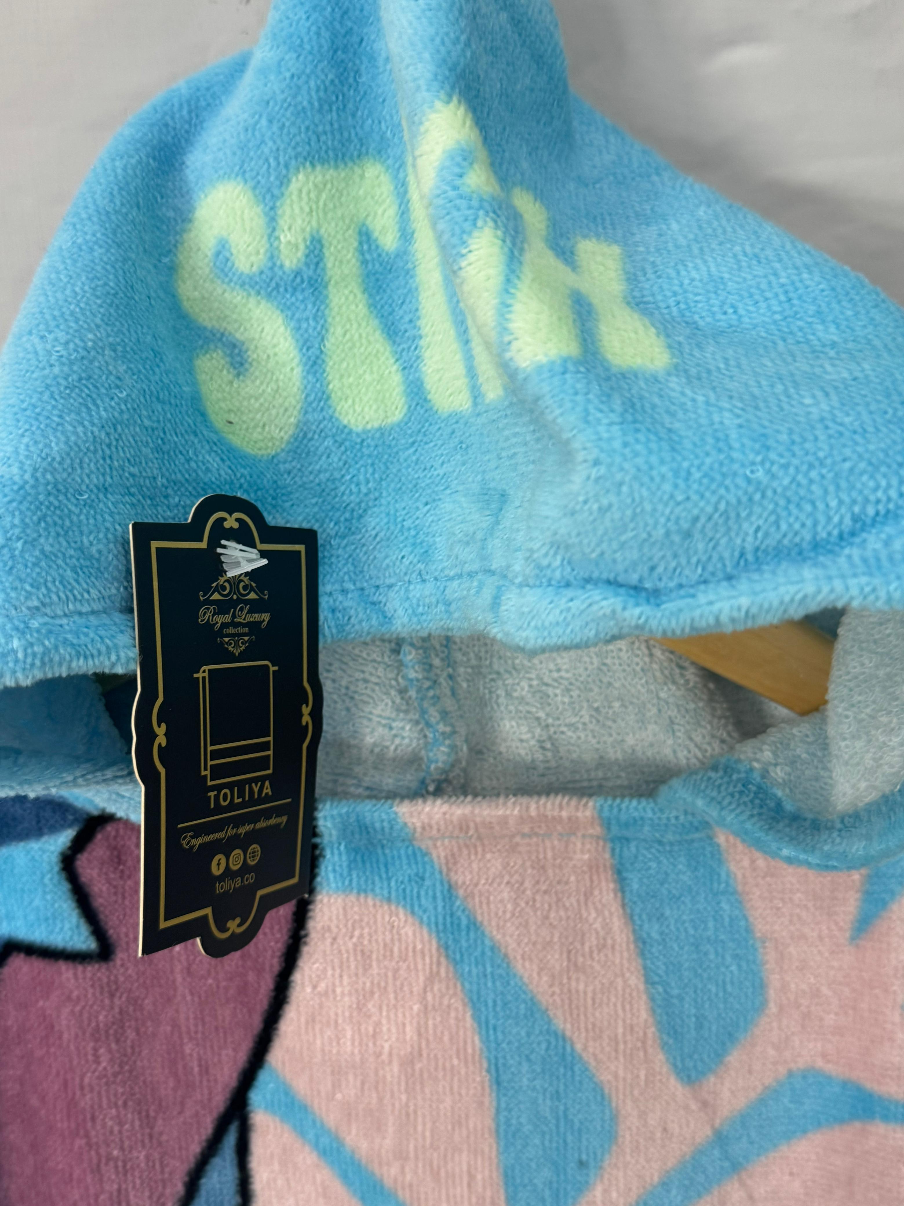 Blue towel with 'STL' logo and brand tag on a white background