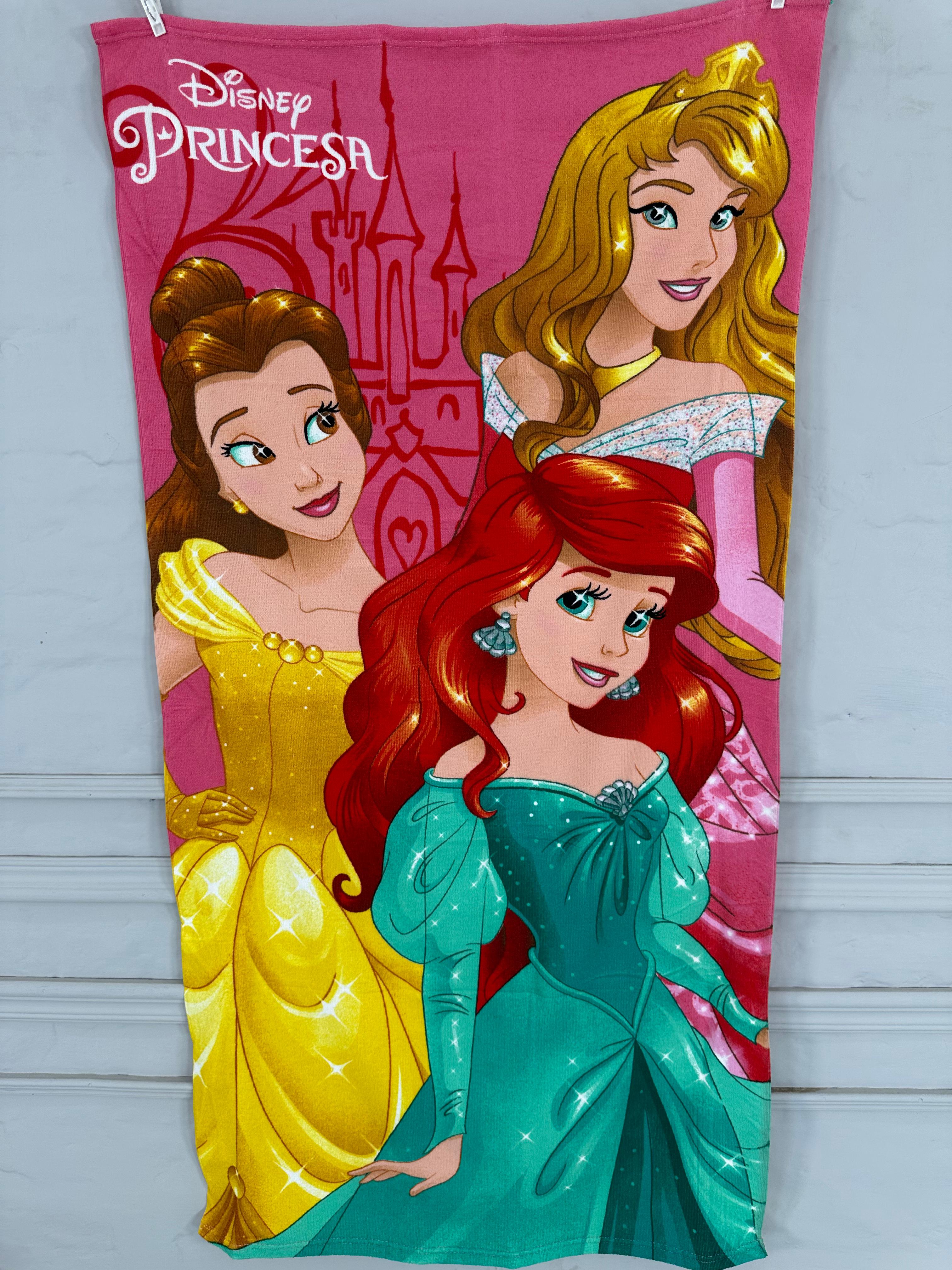 Disney Princess-themed towel with Belle, Ariel, and Aurora on a pink background.
