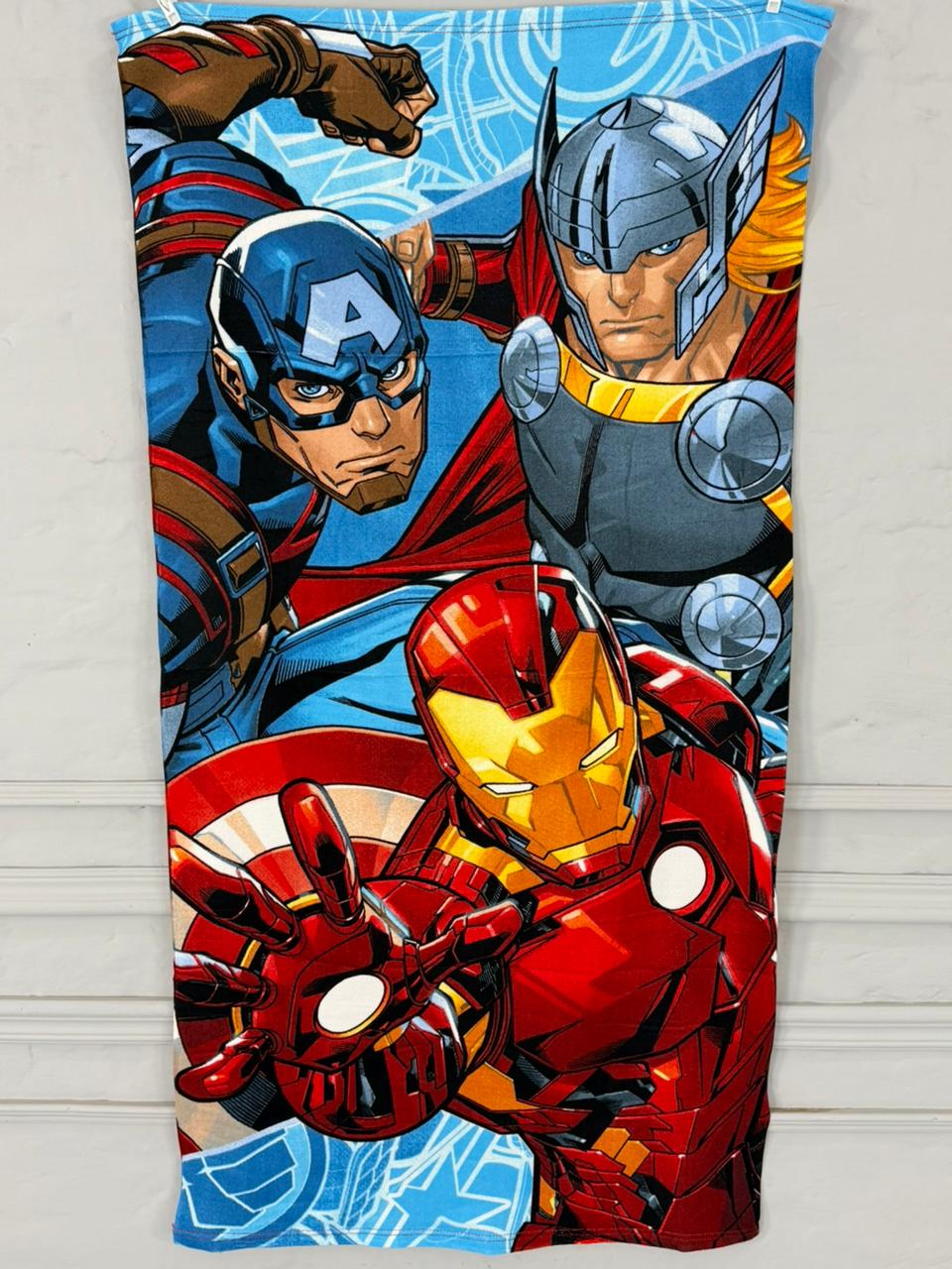 Superhero-themed towel featuring Captain America, Thor, and Iron Man on a white background