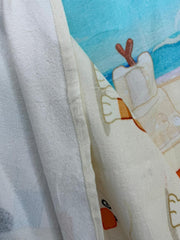 Close-up of a cartoon character on a fabric surface