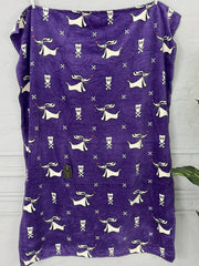 Purple towel with white dog pattern on a white background