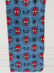 Spider-Man patterned towel on a wooden surface