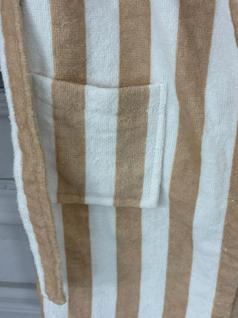Close-up of a brown and white striped fabric texture